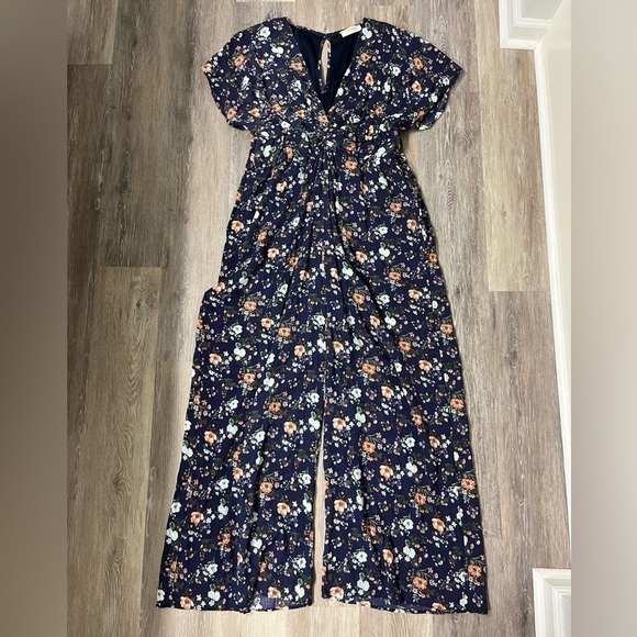 A Beautiful Soul Altar’d State navy floral textured wide leg jumpsuit, C=22/24. - Picture 1 of 9